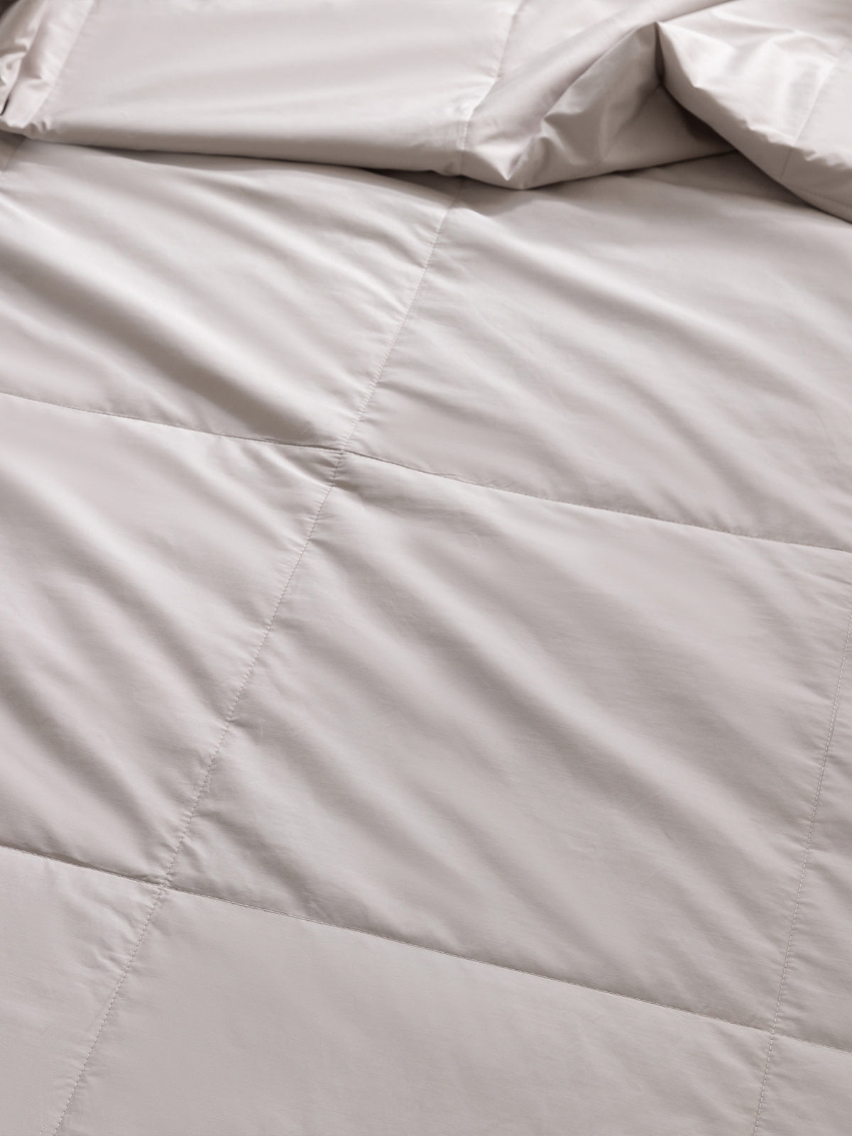 Couette d'été lavable garnie de soie